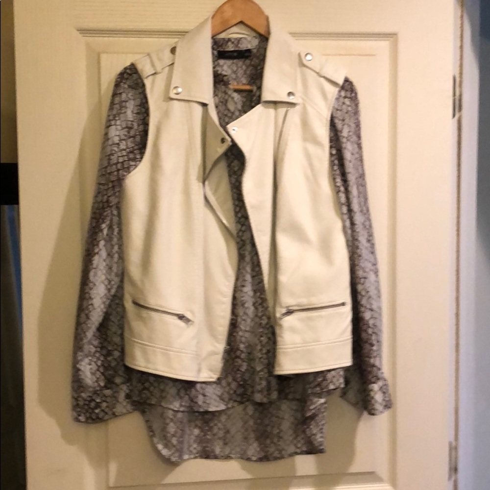 White faux leather vest with silver hardware